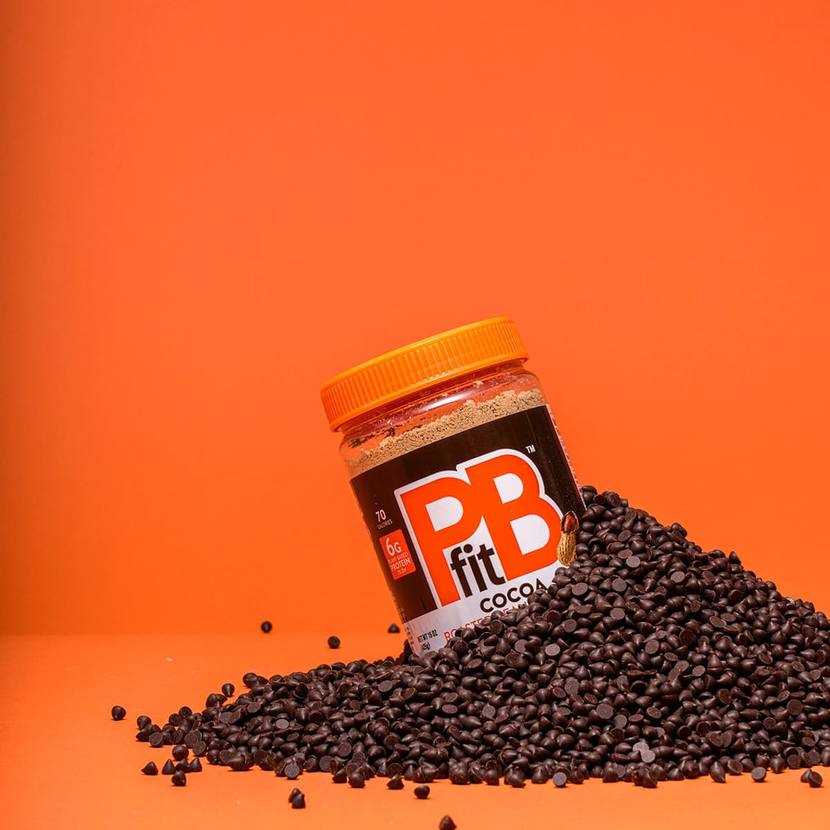 PBfit Cocoa in a pile of chocolate chips